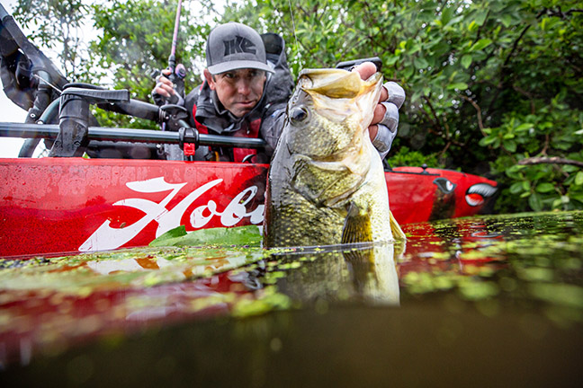 Ike in Hobie with Bass